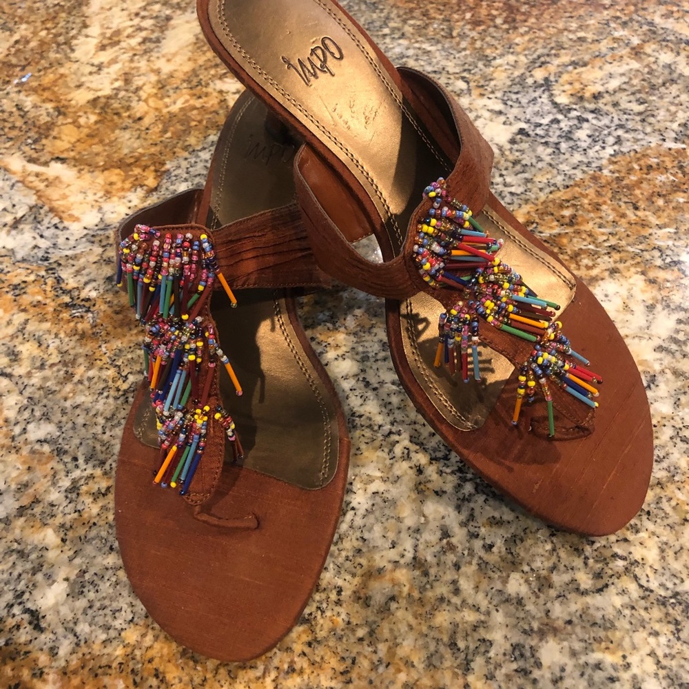 ODM heeled sandals with multi colored fringe beads.